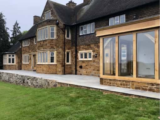 This is a photo of Bespoke wooden Bi folding doors. These were installed by Bi fold doors Southampton